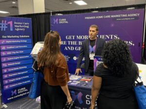 Curis Digital booth at HomeCareCon 2025, showcasing marketing services to home care professionals.