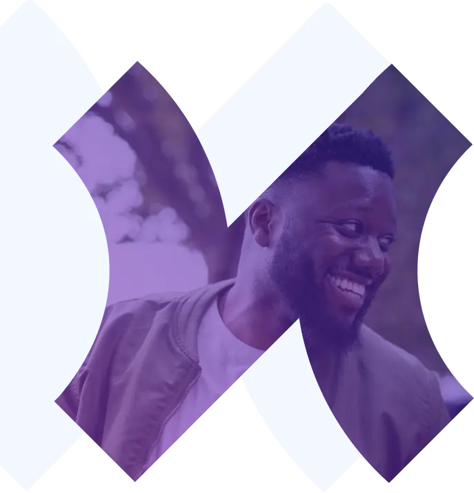 A smiling young man framed within a purple-tinted decorative geometric shape on a light background